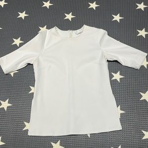 Thick cream half sleeve blouse